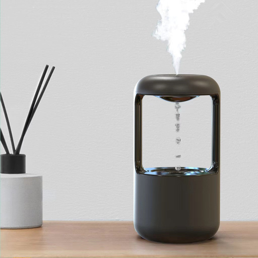 Pookni premium anti gravity water drop humidifier dispersing refreshing mist in a modern bedroom for indoor wellness and skincare